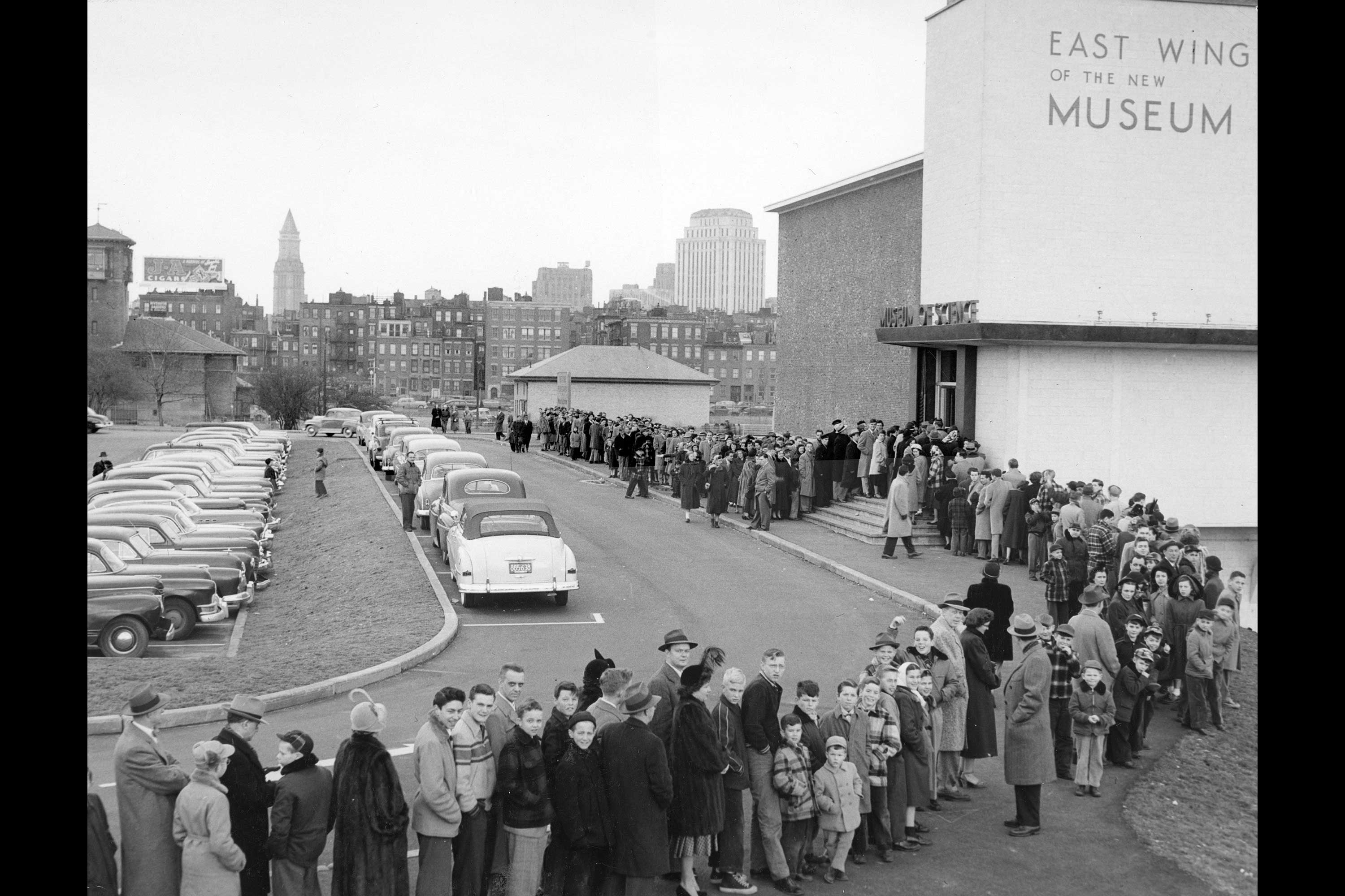 Museum Opening Day 1951. This is a photograph of a crowd of people waiting in line in front of the first Museum building.