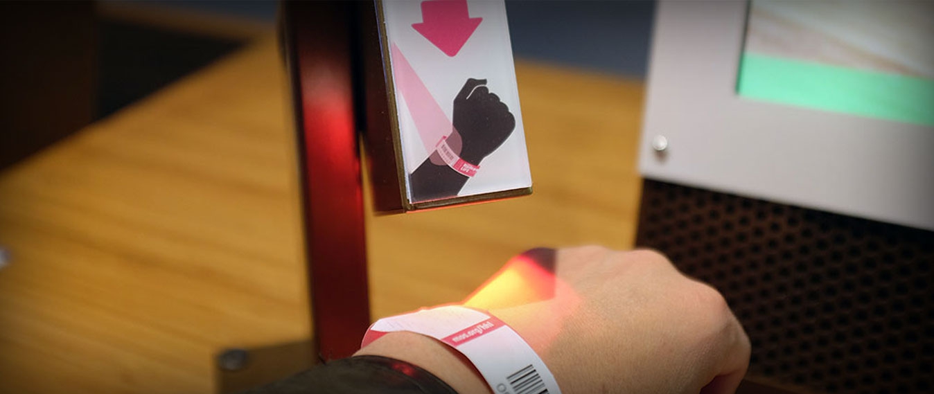 Wristband being scanned
